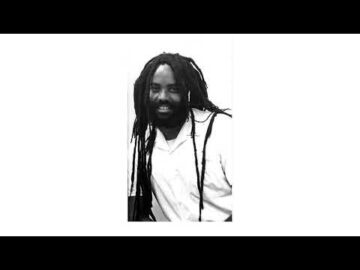 "Mumia Urges No vote on Pacifica Referendum."